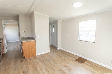 Newly renovated oversized single-wide manufactured home situated on Prestwick Country Club in South Carolina - for sale on GolfHomes.com, golf home, golf lot