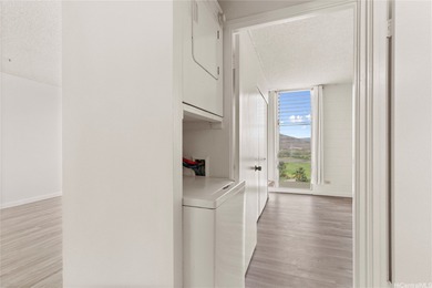 Come home to tranquil golf course views in this 2-bedroom on Honolulu Country Club in Hawaii - for sale on GolfHomes.com, golf home, golf lot