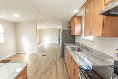 Newly renovated oversized single-wide manufactured home situated on Prestwick Country Club in South Carolina - for sale on GolfHomes.com, golf home, golf lot