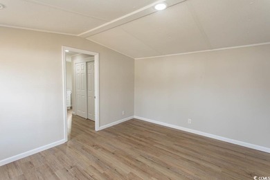 Newly renovated oversized single-wide manufactured home situated on Prestwick Country Club in South Carolina - for sale on GolfHomes.com, golf home, golf lot