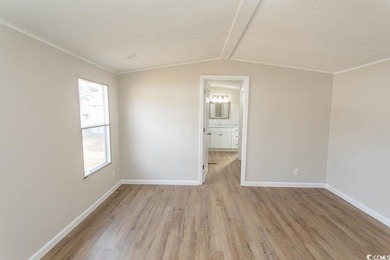 Newly renovated oversized single-wide manufactured home situated on Prestwick Country Club in South Carolina - for sale on GolfHomes.com, golf home, golf lot