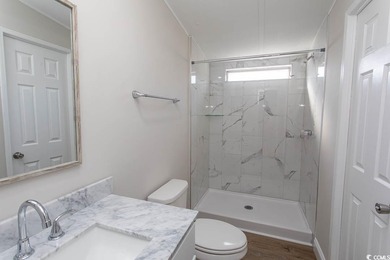 Newly renovated oversized single-wide manufactured home situated on Prestwick Country Club in South Carolina - for sale on GolfHomes.com, golf home, golf lot