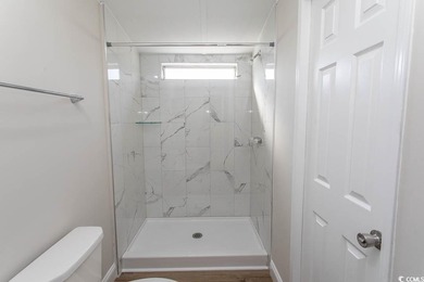 Newly renovated oversized single-wide manufactured home situated on Prestwick Country Club in South Carolina - for sale on GolfHomes.com, golf home, golf lot