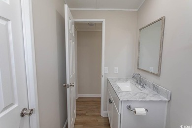 Newly renovated oversized single-wide manufactured home situated on Prestwick Country Club in South Carolina - for sale on GolfHomes.com, golf home, golf lot