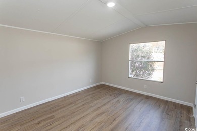 Newly renovated oversized single-wide manufactured home situated on Prestwick Country Club in South Carolina - for sale on GolfHomes.com, golf home, golf lot