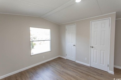 Newly renovated oversized single-wide manufactured home situated on Prestwick Country Club in South Carolina - for sale on GolfHomes.com, golf home, golf lot