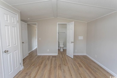 Newly renovated oversized single-wide manufactured home situated on Prestwick Country Club in South Carolina - for sale on GolfHomes.com, golf home, golf lot
