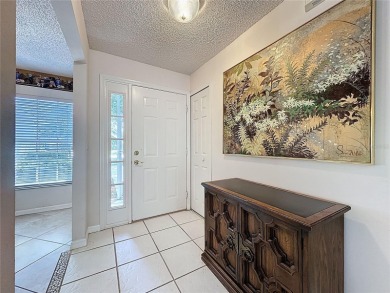 This Crown model is priced to sell. Home is being sold furnished on Kings Ridge Golf Club in Florida - for sale on GolfHomes.com, golf home, golf lot