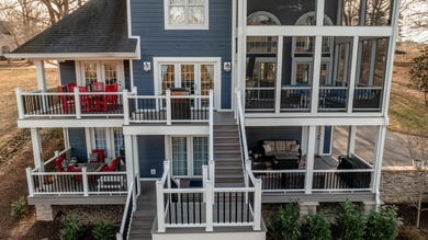 Discover the epitome of lakeside sophistication at this on Links At Lily Creek Resort in Kentucky - for sale on GolfHomes.com, golf home, golf lot