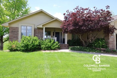 Enjoy peaceful evenings on your covered back deck overlooking on The Golf Club At Southwind in Kansas - for sale on GolfHomes.com, golf home, golf lot
