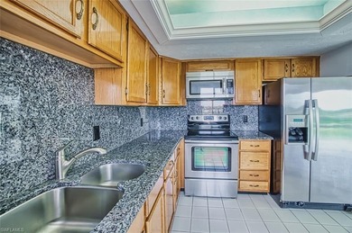 Amazing Top Floor Waterfront Living that overlooks the 12th on Seven Lakes Golf and Tennis Community in Florida - for sale on GolfHomes.com, golf home, golf lot