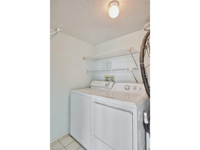 Amazing Top Floor Waterfront Living that overlooks the 12th on Seven Lakes Golf and Tennis Community in Florida - for sale on GolfHomes.com, golf home, golf lot