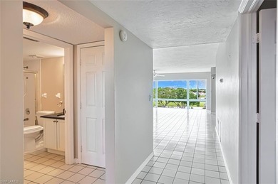 Amazing Top Floor Waterfront Living that overlooks the 12th on Seven Lakes Golf and Tennis Community in Florida - for sale on GolfHomes.com, golf home, golf lot