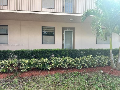 GREAT AND HIGHLY SOUGHT AFTER GROUND FLOOR 2/2 UNIT! ALL TILES on Sunrise Lakes Phase IV Golf Course in Florida - for sale on GolfHomes.com, golf home, golf lot
