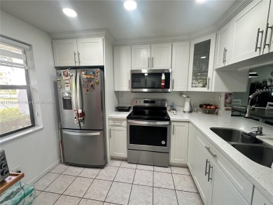 GREAT AND HIGHLY SOUGHT AFTER GROUND FLOOR 2/2 UNIT! ALL TILES on Sunrise Lakes Phase IV Golf Course in Florida - for sale on GolfHomes.com, golf home, golf lot