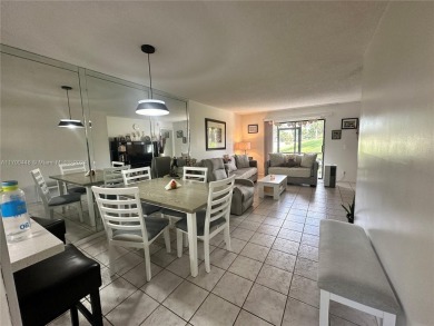 GREAT AND HIGHLY SOUGHT AFTER GROUND FLOOR 2/2 UNIT! ALL TILES on Sunrise Lakes Phase IV Golf Course in Florida - for sale on GolfHomes.com, golf home, golf lot