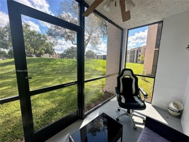 GREAT AND HIGHLY SOUGHT AFTER GROUND FLOOR 2/2 UNIT! ALL TILES on Sunrise Lakes Phase IV Golf Course in Florida - for sale on GolfHomes.com, golf home, golf lot