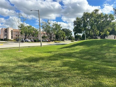 GREAT AND HIGHLY SOUGHT AFTER GROUND FLOOR 2/2 UNIT! ALL TILES on Sunrise Lakes Phase IV Golf Course in Florida - for sale on GolfHomes.com, golf home, golf lot