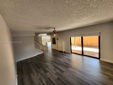 Wake up every morning to a serene golf course and water views in on Pine Island Ridge Country Club in Florida - for sale on GolfHomes.com, golf home, golf lot