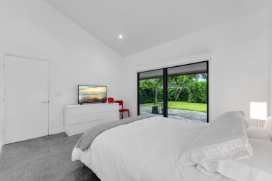 Bright and inviting, this 3-bedroom, 3-bath bungalow offers on Palm Beach Polo and Country Club in Florida - for sale on GolfHomes.com, golf home, golf lot