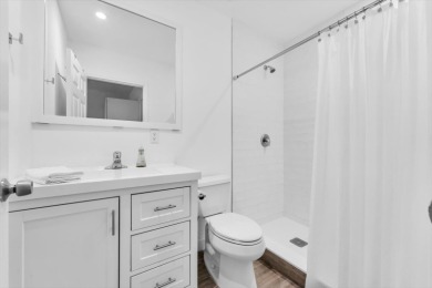 Bright and inviting, this 3-bedroom, 3-bath bungalow offers on Palm Beach Polo and Country Club in Florida - for sale on GolfHomes.com, golf home, golf lot