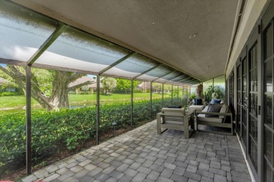 Bright and inviting, this 3-bedroom, 3-bath bungalow offers on Palm Beach Polo and Country Club in Florida - for sale on GolfHomes.com, golf home, golf lot