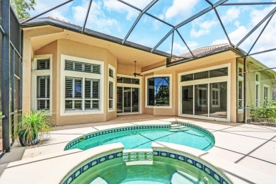 STUNNING POOL HOME WITH SWEEPING GOLF COURSE VIEW IN PGA on PGA Golf Club in PGA Village in Florida - for sale on GolfHomes.com, golf home, golf lot