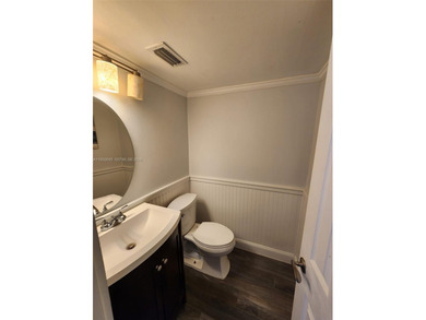 Wake up every morning to a serene golf course and water views in on Pine Island Ridge Country Club in Florida - for sale on GolfHomes.com, golf home, golf lot