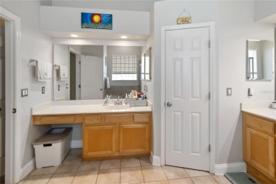 This stunning 3-bedroom, 2.5-bathroom pool home offers the on Hunters Creek Golf Course in Florida - for sale on GolfHomes.com, golf home, golf lot