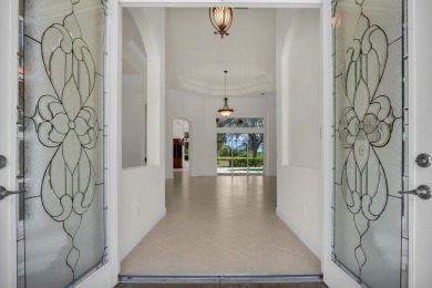 STUNNING POOL HOME WITH SWEEPING GOLF COURSE VIEW IN PGA on PGA Golf Club in PGA Village in Florida - for sale on GolfHomes.com, golf home, golf lot