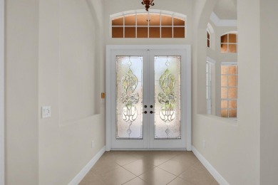 STUNNING POOL HOME WITH SWEEPING GOLF COURSE VIEW IN PGA on PGA Golf Club in PGA Village in Florida - for sale on GolfHomes.com, golf home, golf lot
