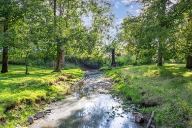 Ranch home on over 3 acres in Big Walnut Schools backing to on Rattlesnake Ridge Golf Club in Ohio - for sale on GolfHomes.com, golf home, golf lot