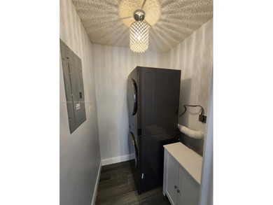 Wake up every morning to a serene golf course and water views in on Pine Island Ridge Country Club in Florida - for sale on GolfHomes.com, golf home, golf lot