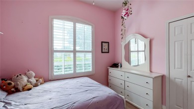 This stunning 3-bedroom, 2.5-bathroom pool home offers the on Hunters Creek Golf Course in Florida - for sale on GolfHomes.com, golf home, golf lot