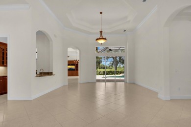 STUNNING POOL HOME WITH SWEEPING GOLF COURSE VIEW IN PGA on PGA Golf Club in PGA Village in Florida - for sale on GolfHomes.com, golf home, golf lot