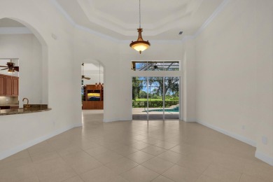 STUNNING POOL HOME WITH SWEEPING GOLF COURSE VIEW IN PGA on PGA Golf Club in PGA Village in Florida - for sale on GolfHomes.com, golf home, golf lot