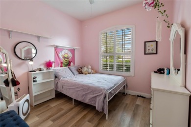 This stunning 3-bedroom, 2.5-bathroom pool home offers the on Hunters Creek Golf Course in Florida - for sale on GolfHomes.com, golf home, golf lot
