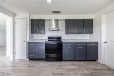 This affordable gem is perfect for a first-time homebuyer or on Port Charlotte Golf Club in Florida - for sale on GolfHomes.com, golf home, golf lot