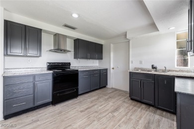 This affordable gem is perfect for a first-time homebuyer or on Port Charlotte Golf Club in Florida - for sale on GolfHomes.com, golf home, golf lot
