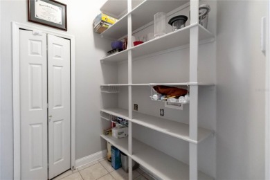 This stunning 3-bedroom, 2.5-bathroom pool home offers the on Hunters Creek Golf Course in Florida - for sale on GolfHomes.com, golf home, golf lot