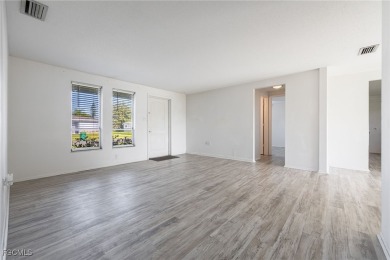 This affordable gem is perfect for a first-time homebuyer or on Port Charlotte Golf Club in Florida - for sale on GolfHomes.com, golf home, golf lot