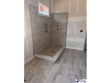 Step into timeless elegance with this new construction home by on The Traces Golf Club in South Carolina - for sale on GolfHomes.com, golf home, golf lot