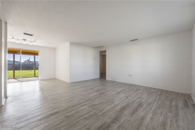 This affordable gem is perfect for a first-time homebuyer or on Port Charlotte Golf Club in Florida - for sale on GolfHomes.com, golf home, golf lot