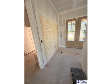 Step into timeless elegance with this new construction home by on The Traces Golf Club in South Carolina - for sale on GolfHomes.com, golf home, golf lot