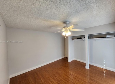 Wake up every morning to a serene golf course and water views in on Pine Island Ridge Country Club in Florida - for sale on GolfHomes.com, golf home, golf lot