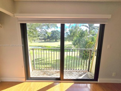 Wake up every morning to a serene golf course and water views in on Pine Island Ridge Country Club in Florida - for sale on GolfHomes.com, golf home, golf lot