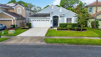 This stunning 3-bedroom, 2.5-bathroom pool home offers the on Hunters Creek Golf Course in Florida - for sale on GolfHomes.com, golf home, golf lot