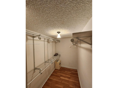 Wake up every morning to a serene golf course and water views in on Pine Island Ridge Country Club in Florida - for sale on GolfHomes.com, golf home, golf lot