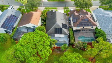 This stunning 3-bedroom, 2.5-bathroom pool home offers the on Hunters Creek Golf Course in Florida - for sale on GolfHomes.com, golf home, golf lot