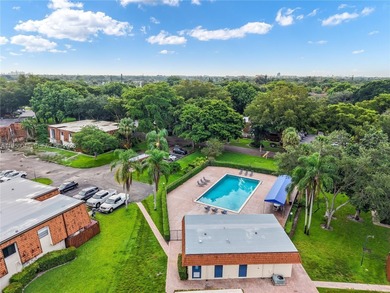 Wake up every morning to a serene golf course and water views in on Pine Island Ridge Country Club in Florida - for sale on GolfHomes.com, golf home, golf lot